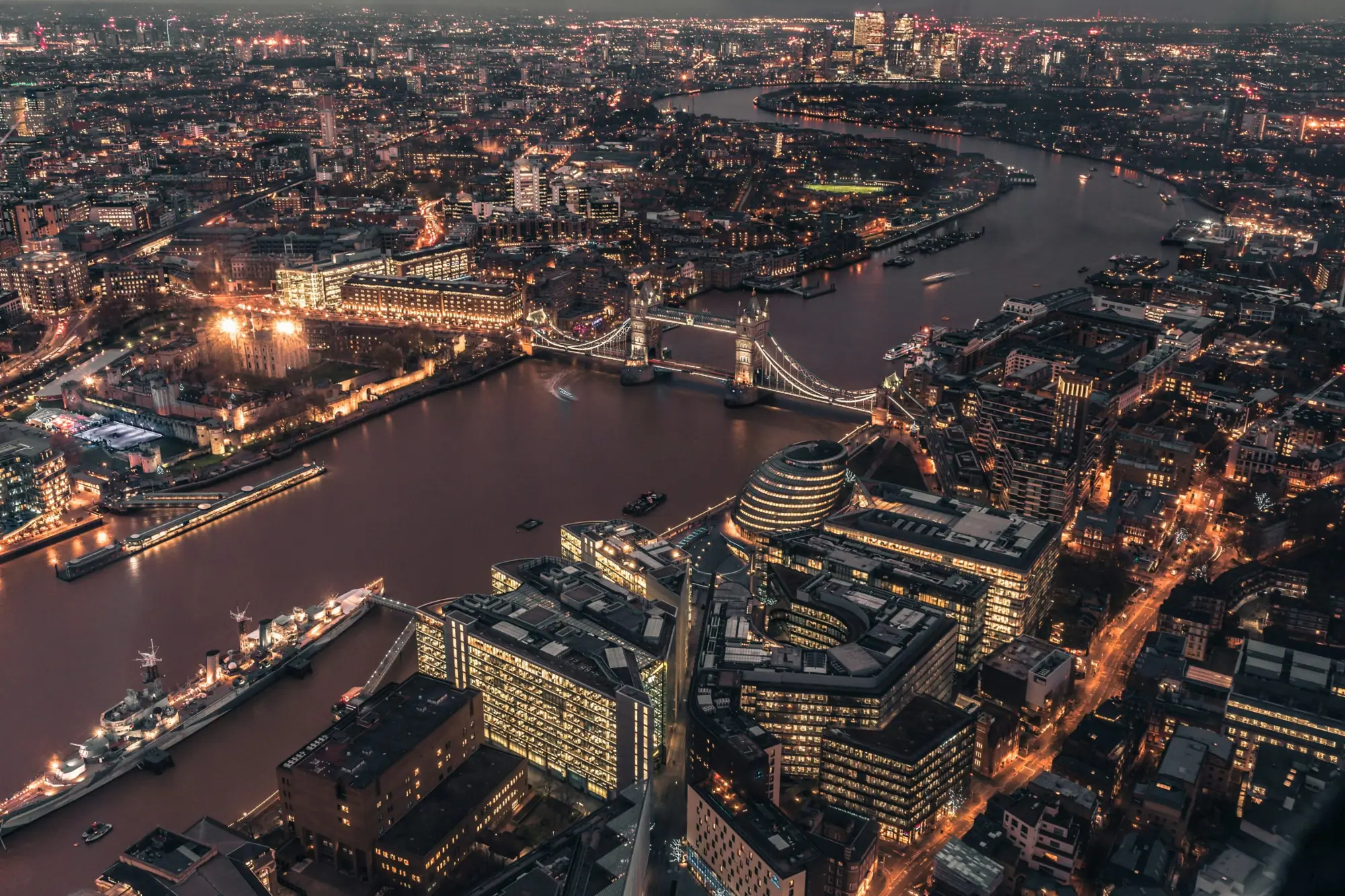 Tower Bridge and the River Thames at night, seen from above